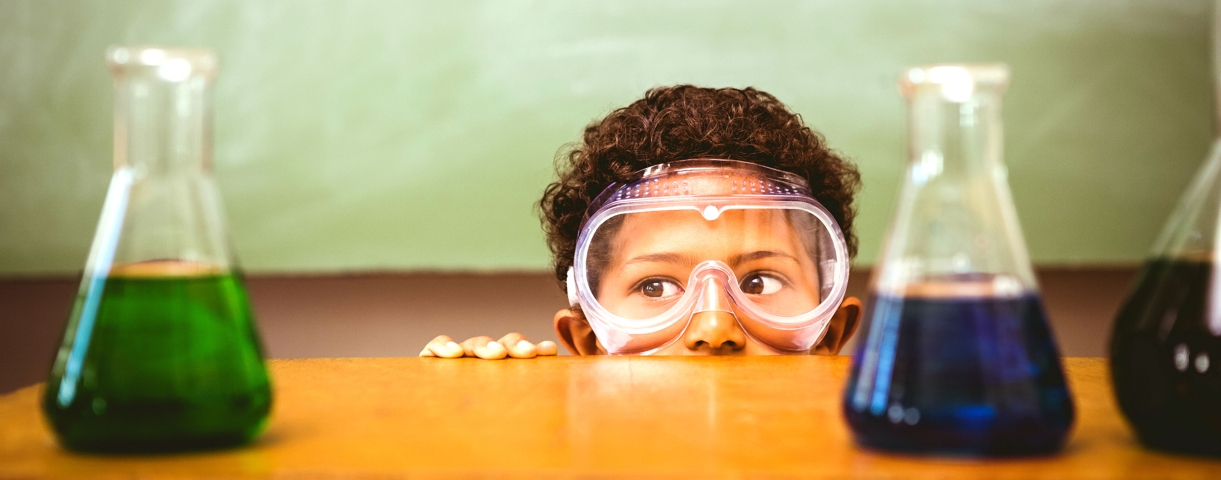 boy with science flasks