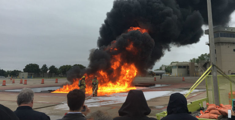 Conference participants watch testing of PFAS-free firefighting foams