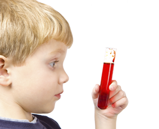 boy_looking_at_beaker
